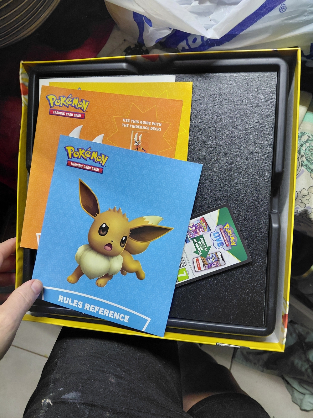 Pokémon Trading Card Game Battle Academy Rules Reference guide featuring Eevee.